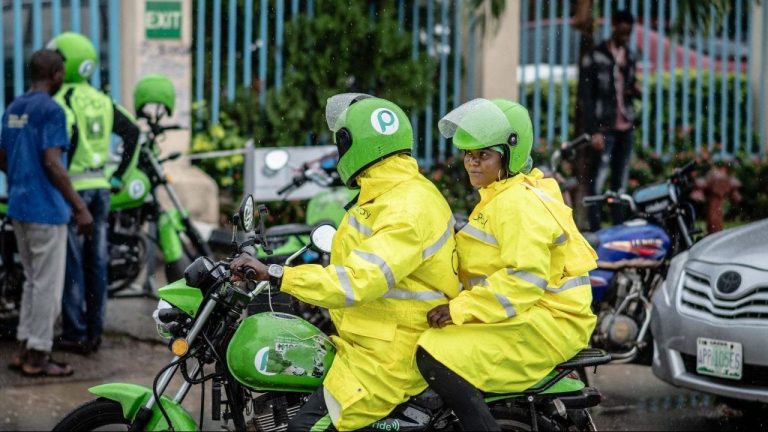 Photo of O{ay motorcycle taxi driver and passenger